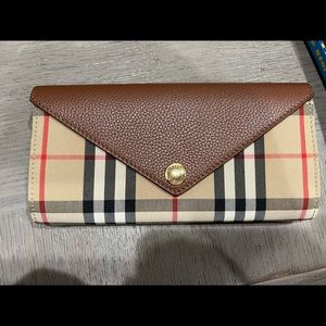 Authentic Burberry wallet to go with crossbody